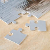 Pélicans par le puzzle de lac (Côté)