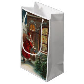 Père Noël dans le sac cadeau de la porte (Dos Angle)