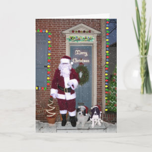 Père Noël et carte de Joyeux Noël d'aides