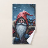 Père Noël Frostbite et son elfe de malice. (Serviette à main)