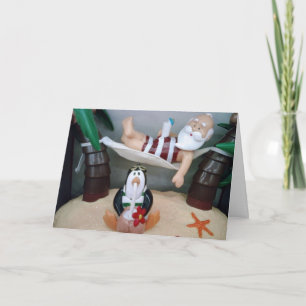 PÈRE NOËL PREND UNE CARTE "NOËL" EN PAIX