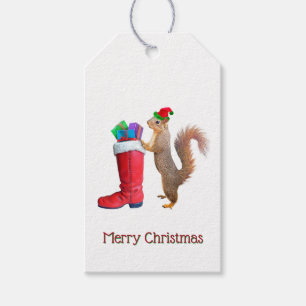 Père Noël Squirrel avec des étiquettes cadeaux