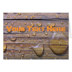 Perles de l'eau sur la photographie en bois