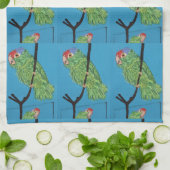 perroquets verts sur linge de cuisine bleu (Plié)