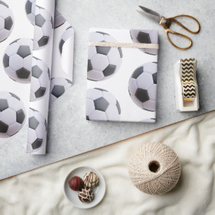 Persoonlijk ingepakte voetbalcadeaupapierrollen cadeaupapier