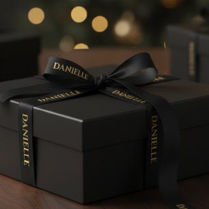 Persoonlijk zwart lint met gouden naam tekst