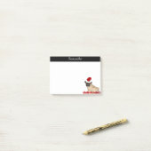 Persoonlijke kersthond postte de notitie post-it® notes (Op bureau)
