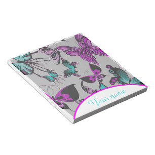 Persoonlijke paarse en turquoise vlinders  notitieblok