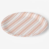 Perziken en witte snoepjes strepen papieren bordje (Gekanteld)
