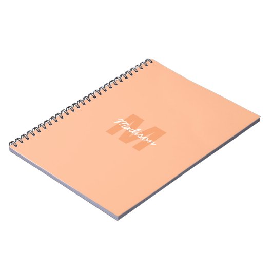 Perzikkleur van 2024 met de naam van het douanemon notitieboek (Linkerzijde)