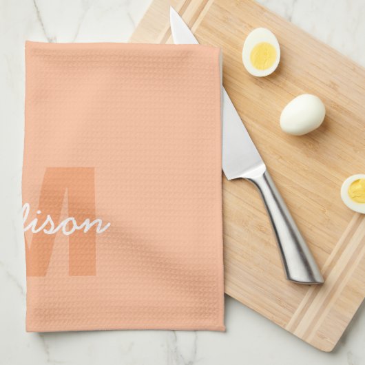 Perzikkleur van 2024 met de naam van het douanemon theedoek (Quarter Fold)