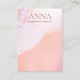 Perzikroze strand met juwelenvertoning visitekaartje