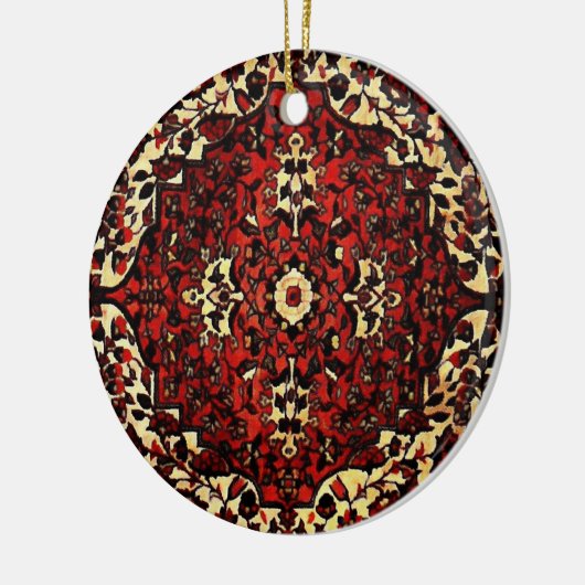 Perzisch tapijt, donkerrood en crème keramisch ornament (Links)