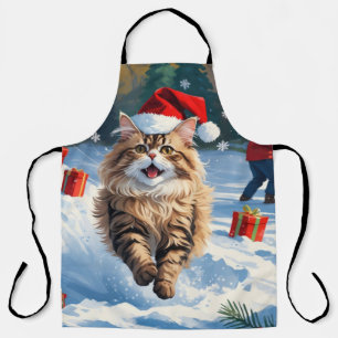Perzische kat zit in de sneeuw met kerstmuts schort