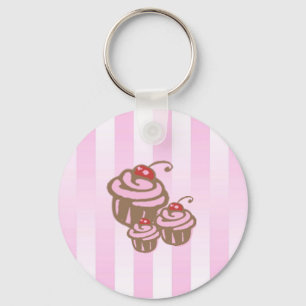 Petit gâteau et porte-clés rose de rayure de