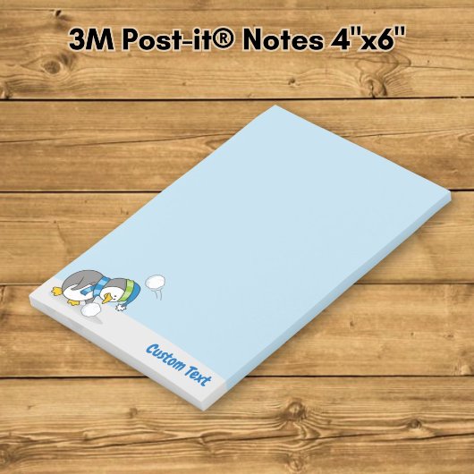 Petit manchot obtenant des Post-it Notes boule de