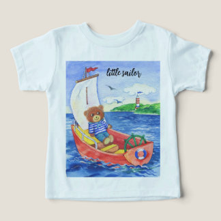 petit marin, ours en peluche dans un bateau