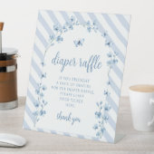 Petit papillon bleu bébé garçon diaper signe de to (In SItu)