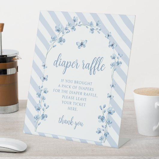 Petit papillon bleu bébé garçon diaper signe de to (In SItu)