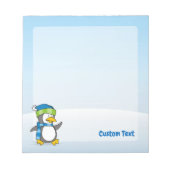 Petit pingouin marchant sur bloc-notes neige (Devant)