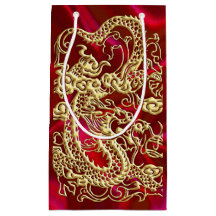 Dragon d'or embouti sur papier satin rouge