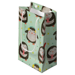 Petit Sac Cadeau Joyeux pingouins portant des chapeaux de Père Noël