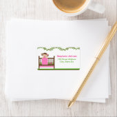 Petit singe dans une fille Étiquette de adresse (En situation)