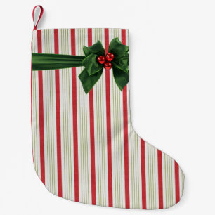 Petite Chaussette De Noël Arc de Noël avec l'arrière - plan de stripey