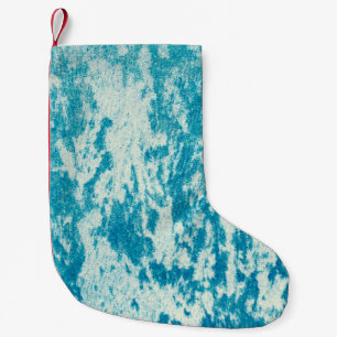 Petite Chaussette De Noël Arrière - plan bleu texturé en tissu dense. Con