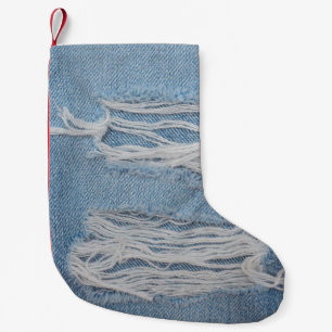 Petite Chaussette De Noël Arrière - plan de texture de jean bleu déchirée. D