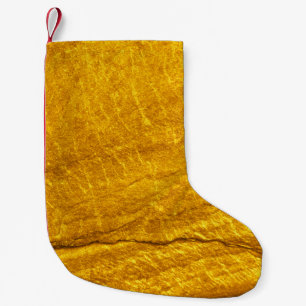 Petite Chaussette De Noël Arrière - plan de texture de pierre d'or. abstrait