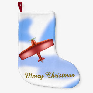 Petite Chaussette De Noël Atterrissage de Noël de l'avion rouge