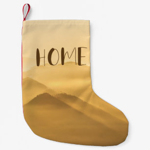 Petite Chaussette De Noël Citation de la maison de lever du soleil sur les c