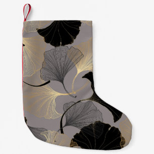 Petite Chaussette De Noël Elégant Ginkgo en or, arrière - plan vintage.