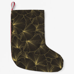 Petite Chaussette De Noël Feuilles dessinés à la main de plantes tropicaux.