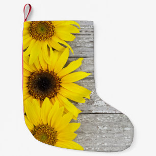 Petite Chaussette De Noël Fleurs de soleil sur une table