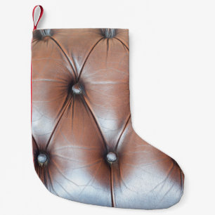 Petite Chaussette De Noël Gênes leather upholstery background, luxury dec