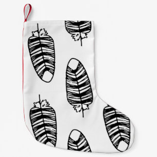 Petite Chaussette De Noël Motif de plumes rayées d'oiseaux. Motif sans faill