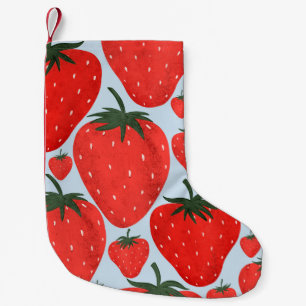 Petite Chaussette De Noël Motif d'été avec fraises isolées à la lumière