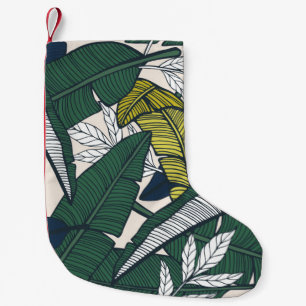Petite Chaussette De Noël Motif tropicale sans couture avec feuilles bananie