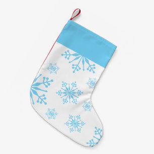 Petite Chaussette De Noël Noël avec des flocons de neige bleus.