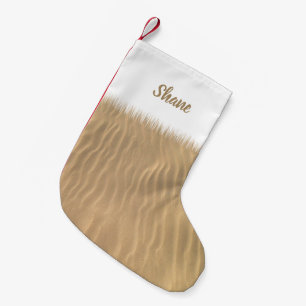 Petite Chaussette De Noël Noël sur les vagues de sable de plage