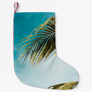 Petite Chaussette De Noël Palmier vert sous ciel bleu