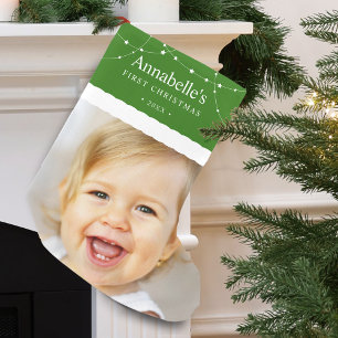 Petite Chaussette De Noël Photo du premier Noël de bébé en vert