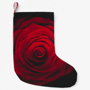 Petite Chaussette De Noël Rose rouge sur effet vintage arrière - plan noir