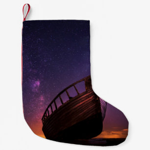 PETITE CHAUSSETTE DE NOËL SILHOUETTE PHOTOGRAPHIE DU BATEAU DE VOILE SUR LE
