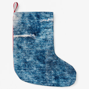 Petite Chaussette De Noël Texture de Denim.Fans bleus avec fils et trous pou