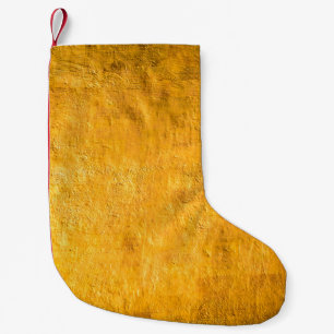 Petite Chaussette De Noël The brass concrete surface glows from the walls of