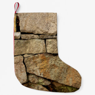 Petite Chaussette De Noël Un mur en pierre en pavé arrière - plan textu