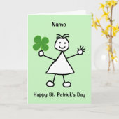 Petite fille avec la carte Shamrock St Patrick's D (Fleur jaune)